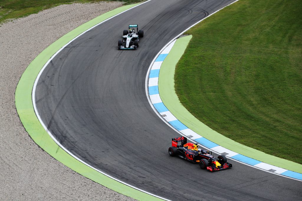 HOCKENHEIM, GERMANY - JULY 31: Daniel Ricciardo of Australia driving the (3) Red Bull Racing Red Bull-TAG Heuer RB12 TAG Heuer leads Nico Rosberg of Germany driving the (6) Mercedes AMG Petronas F1 Team Mercedes F1 WO7 Mercedes PU106C Hybrid turbo on track during the Formula One Grand Prix of Germany at Hockenheimring on July 31, 2016 in Hockenheim, Germany. (Photo by Charles Coates/Getty Images)